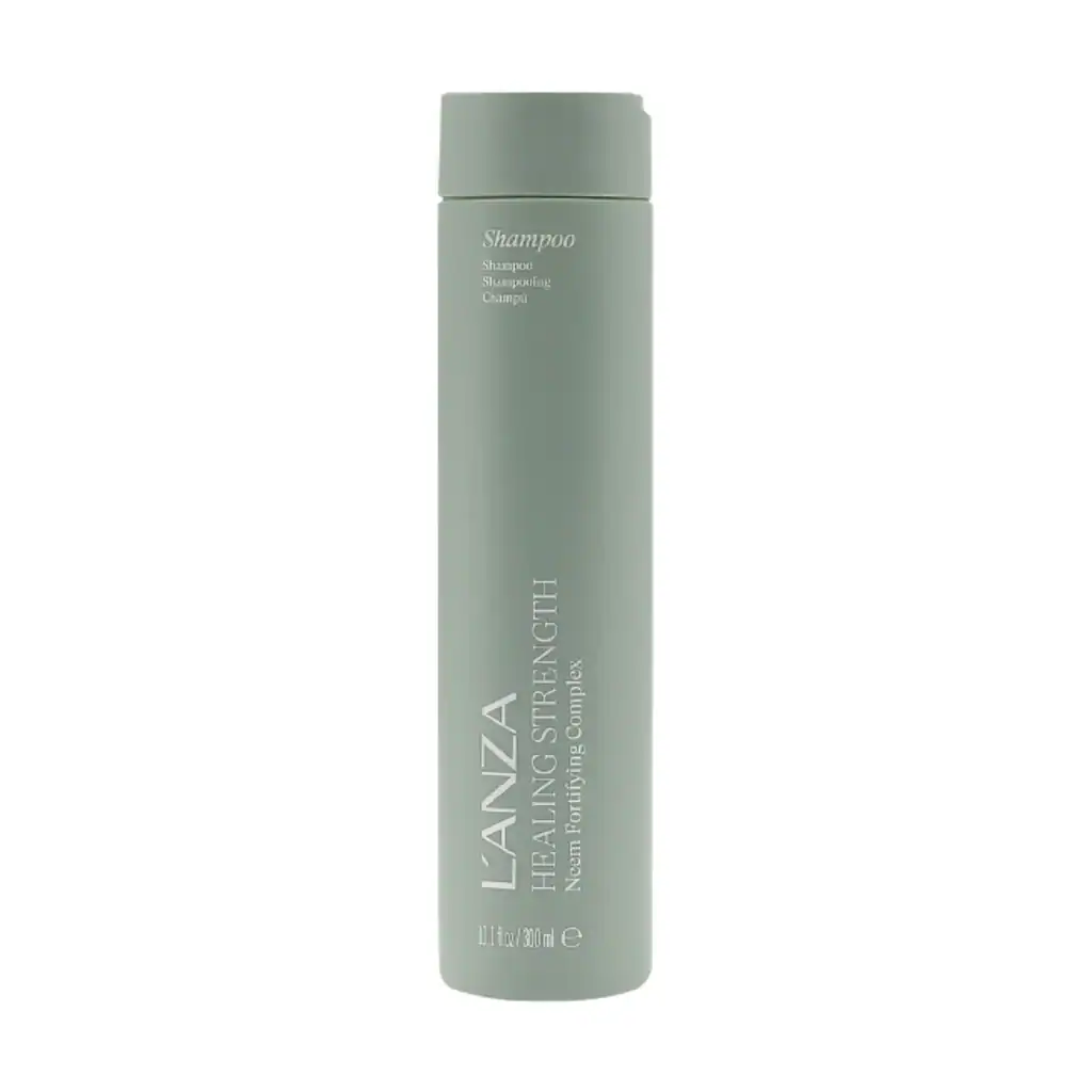 Shampooing réparateur pour cheveux abîmés, fragiles et cassants, enrichi en ingrédients nourrissants.
