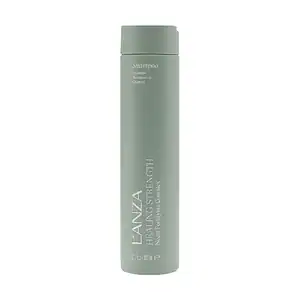 Shampooing réparateur pour cheveux abîmés, fragiles et cassants, enrichi en ingrédients nourrissants.
