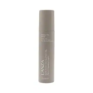 Spray capillaire à l'huile de ricin pour cheveux épais et volumineux.