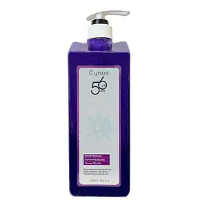 Bouteille de shampooing violet pour cheveux blonds, sans sulfates ni parabènes.